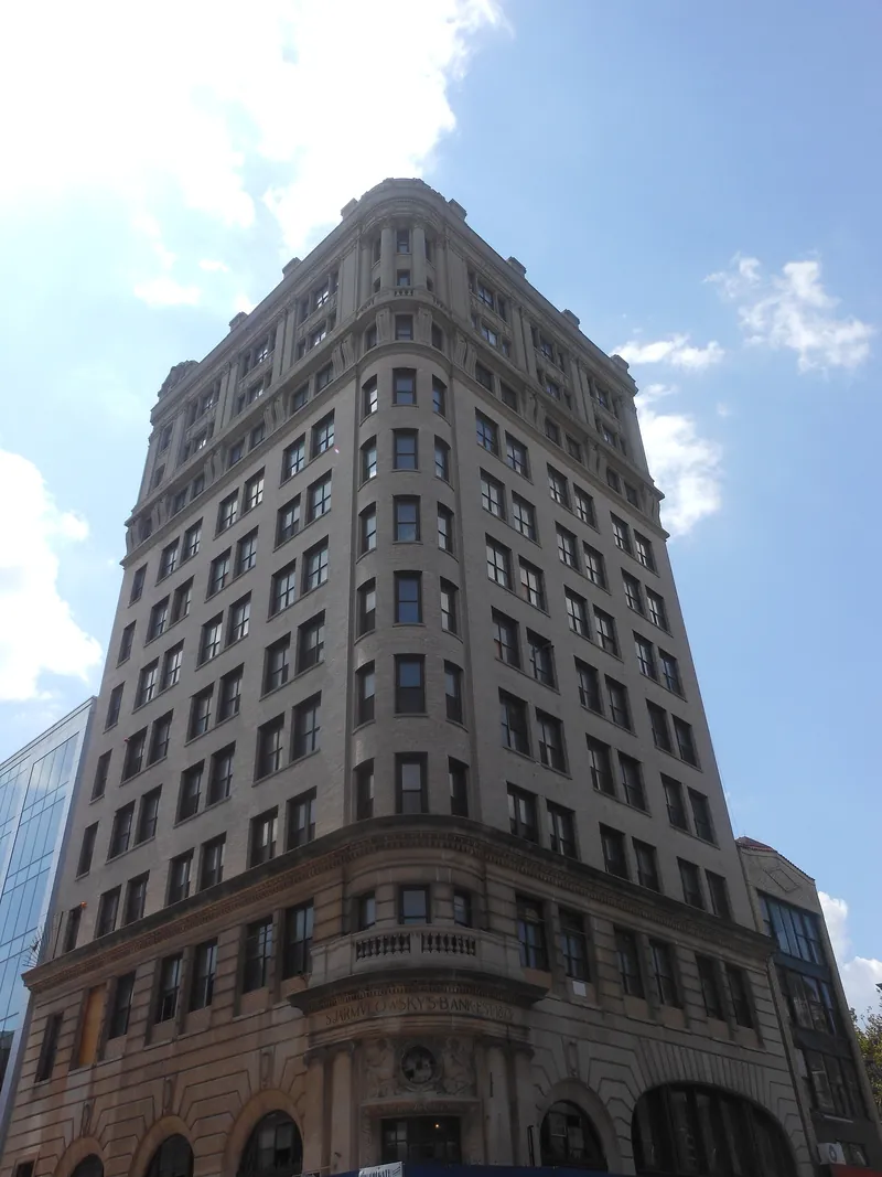 The Jarmulowsky Bank Building tower against a blue sky