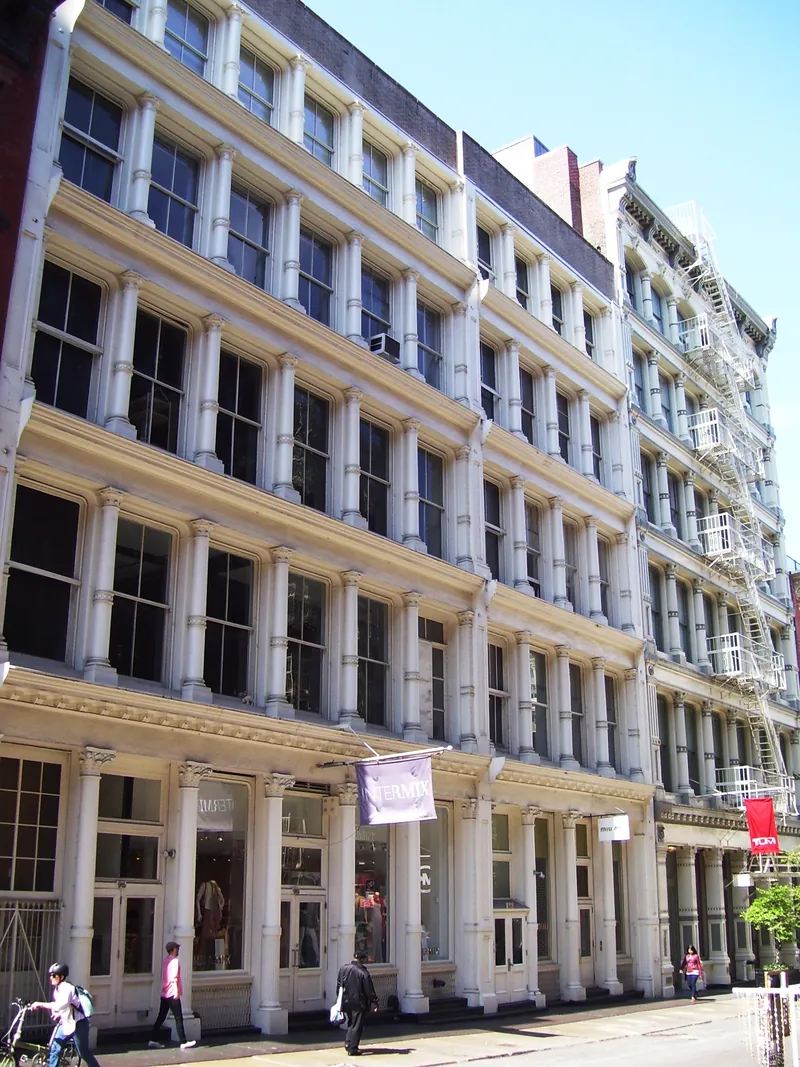 White cast-iron storefront buildings on Prince Street